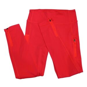 Fabletics Neon Coral Leggings with Zipper Accents And Pockets
